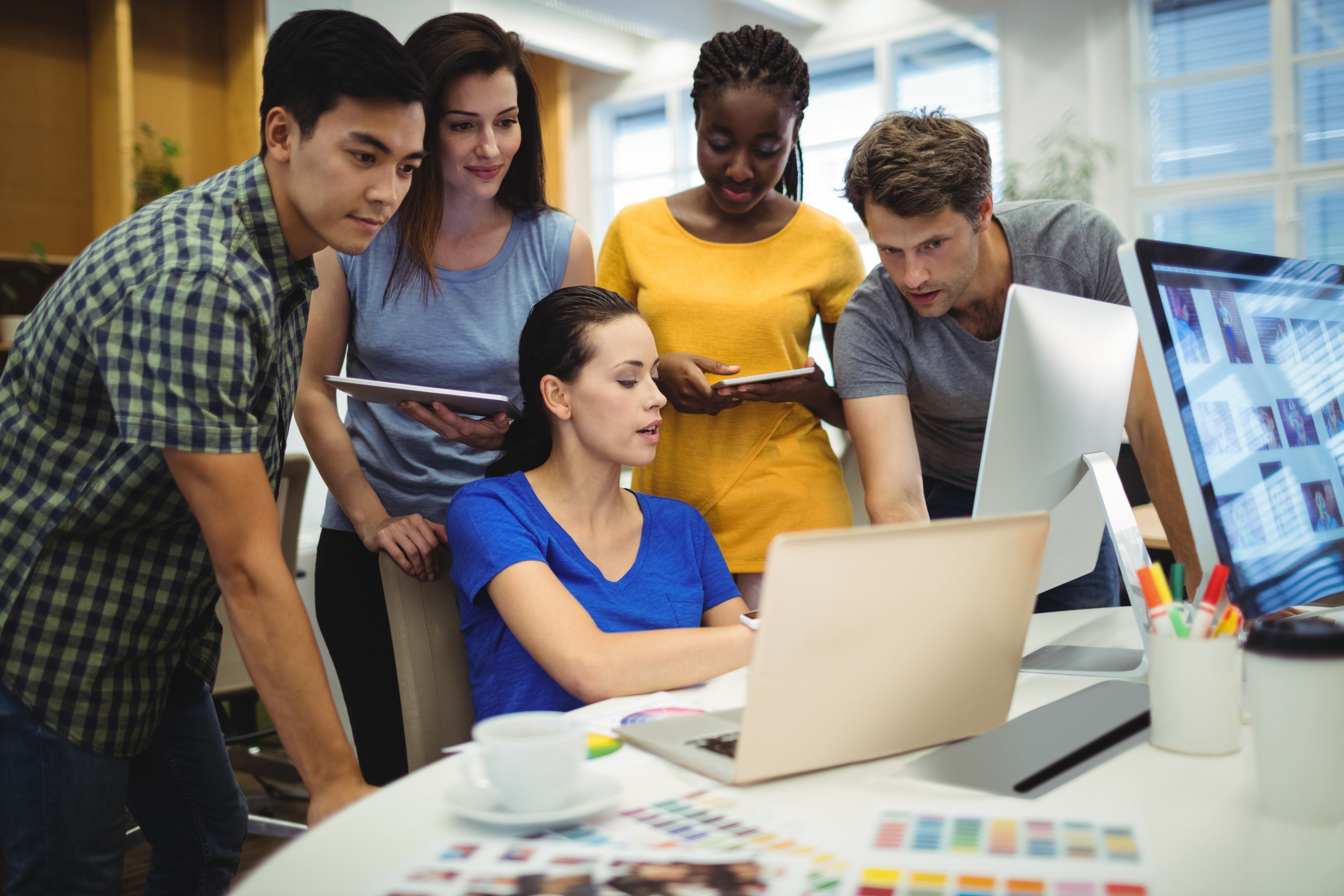 graphic-designers-discussing-laptop-scaled Take Your Website Seriously