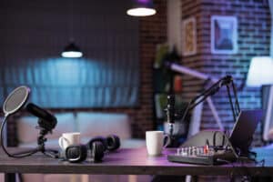empty-home-production-studio-with-professional-podcasting-tools-recording-sound-streaming-sites-entertainment-show-live-broadcasting-from-cozy-location-living-room-decorated-with-purple-lights-300x200 Your Ultimate Guide On Podcast How To Start: From Concept To Launch