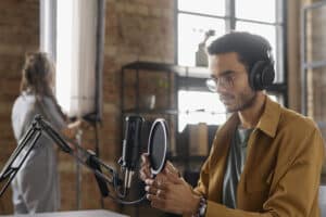 medium-shot-young-people-preparing-podcast-300x200 Your Ultimate Guide On Podcast How To Start: From Concept To Launch